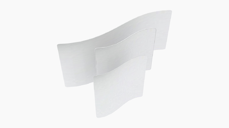Curved Tube Frame Backdrop - Curved Visual Drama, Compact Floor Footprint Curved tube frame backdrop with seamless stretch fabric cover creating a distinctive brand presence at trade shows and events